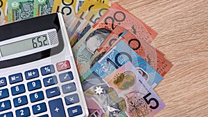 Australian money aud with calculator on desk