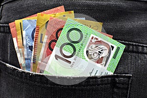 Australian money in jeans back pocket