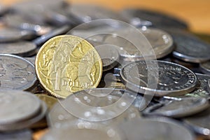 Australian One dollar close up stack coins