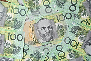 Australian one hundred dollar bills on the table background, finance, currency and business concept