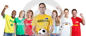 Australian soccer supporter with fans from other countries