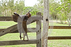 Old Australian stock saddle on gate