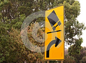Australian street sign - lorries might tip over