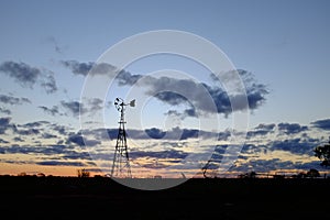Australian sunrise Windmill silhouette