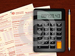 Australian tax return with calculator and pencil on wooden table