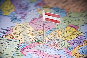 Austria marked with a flag on the map