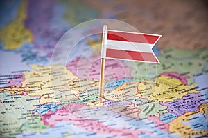 Austria marked with a flag on the map