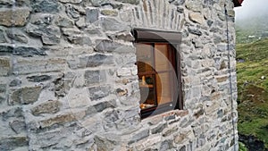 Austria. Mountain hotel `Franz-zenn-hÃ¼tte`. Window of the hotel room.