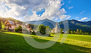 Austria traditional church with chapel in village