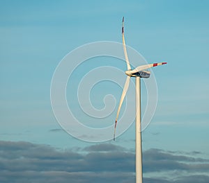 Austria, road to Vienna from Bratislava - 01.14.2024: Wind farm park next to a road in Austria in sunny weather