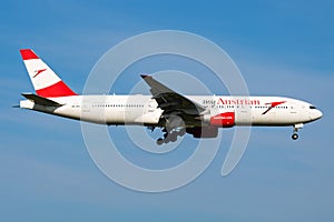 Austrian Airlines Boeing 777-200 OE-LPD passenger plane arrival and landing at Vienna Airport