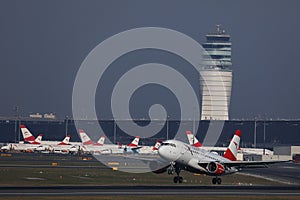 Austrian Airlines plane taking off from runway in Vienna Airport, VIE