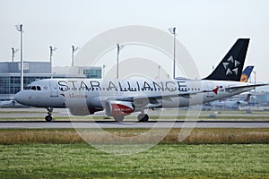 Austrian Airlines Star Alliance plane taking off from runway