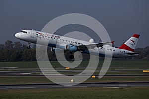 Austrian Airlines plane taking off from the runway in Vienna Airport, VIE