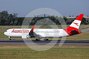 Austrian Airlines plane doing taxi on taxiway