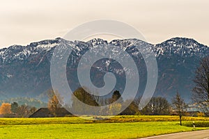 Austrian alps, Green meadows, alpine cottages and mountain peaks