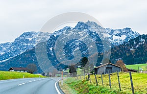 Austrian alps, Green meadows, alpine cottages and mountain peaks