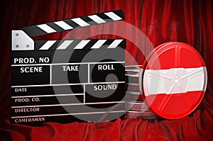 Austrian cinematography, film industry, cinema in Austria. Clapperboard with and film reels on the red fabric, 3D rendering