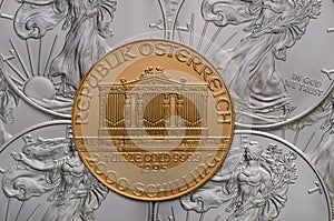 Austrian Gold Philharmonic ontop of US Silver Eagles