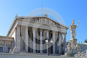 Austrian parlament facade looking at the famous historical ring street of the city