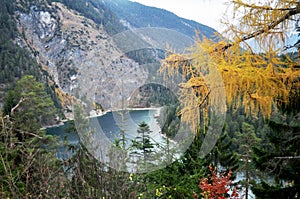 Austrian people and foreign travelers rest and dining at Rasthaus Zugspitzblick restaurant and visit viewpoint of Blindsee lake at photo