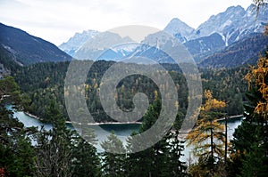 Austrian people and foreign travelers rest and dining at Rasthaus Zugspitzblick restaurant and visit viewpoint of Blindsee lake at photo