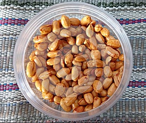 Authentic dry fried peanuts fried over charcoal for a crispier and tastier result.