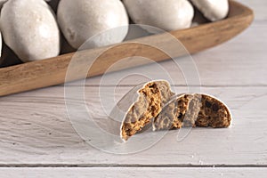 Authentic Gingerbread Spiced Cookies or PfeffernÃÂ¼sse on a White Wooden Table photo