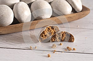 Authentic Gingerbread Spiced Cookies or PfeffernÃÂ¼sse on a White Wooden Table photo