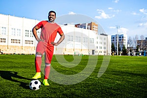 authentic happy football trainer working out outdoor in summer great day