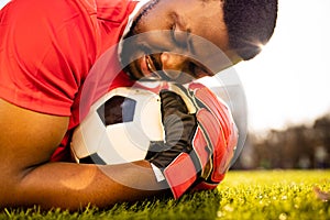 authentic happy football trainer working out outdoor in summer great day