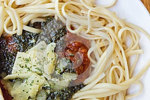 Authentic Italian spaghetti pasta Bolognese with tomato cheese sauce in a restaurant, close up, macro