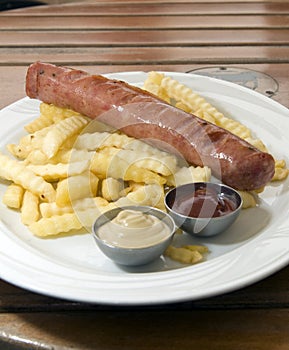 Authentic kielbasa Polish sausage with french fries
