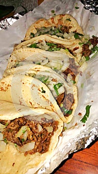 authentic mexican barbacoa, carnitas and chicken tacos