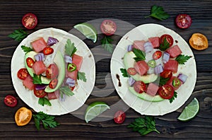 Authentic mexican grilled fish tacos with watermelon Pico de Gallo.