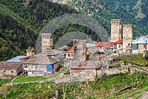 Authentic mountain georgian village with stone domestic buildings and ancient svan towers