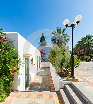 Authentic narrow colorful mediterranean street in Cretan town