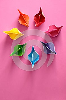 Authentic Origami Boats In Circle On Pink Background