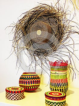 Authentic Panama hat or Paja Toquilla Hat and colored baskets, Ecuador photo