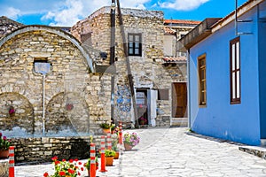 Authentic paved stony streets of Lefkara village with bright and cozy houses