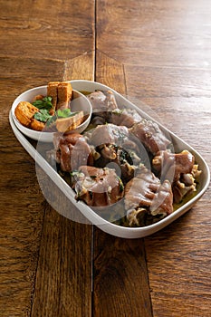 Authentic Portuguese Alentejo Pig Trotters with Coriander Sauce. photo