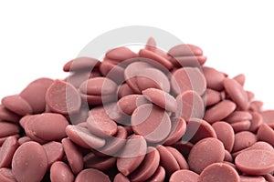 Authentic Ruby Chocolate Drops on a White Background