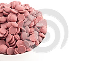 Authentic Ruby Chocolate Drops on a White Background