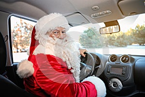 Authentic Santa Claus in car