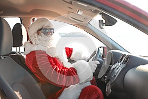 Authentic Santa Claus driving car, view inside