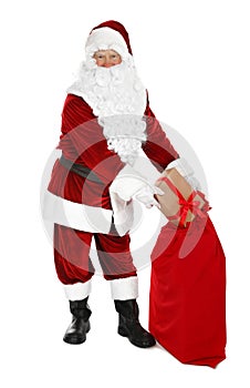 Authentic Santa Claus with sack and gifts