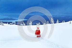 Authentic Santa Claus on a snowy mountain