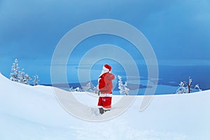 Authentic Santa Claus on a snowy mountain