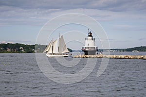 Authentic Schooner Sailboat Sails Past Maine Lighthouse