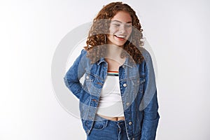 Authentic studio shot attractive carefree redhead curly queer young girl freckles pimples having fun laughing joyfully